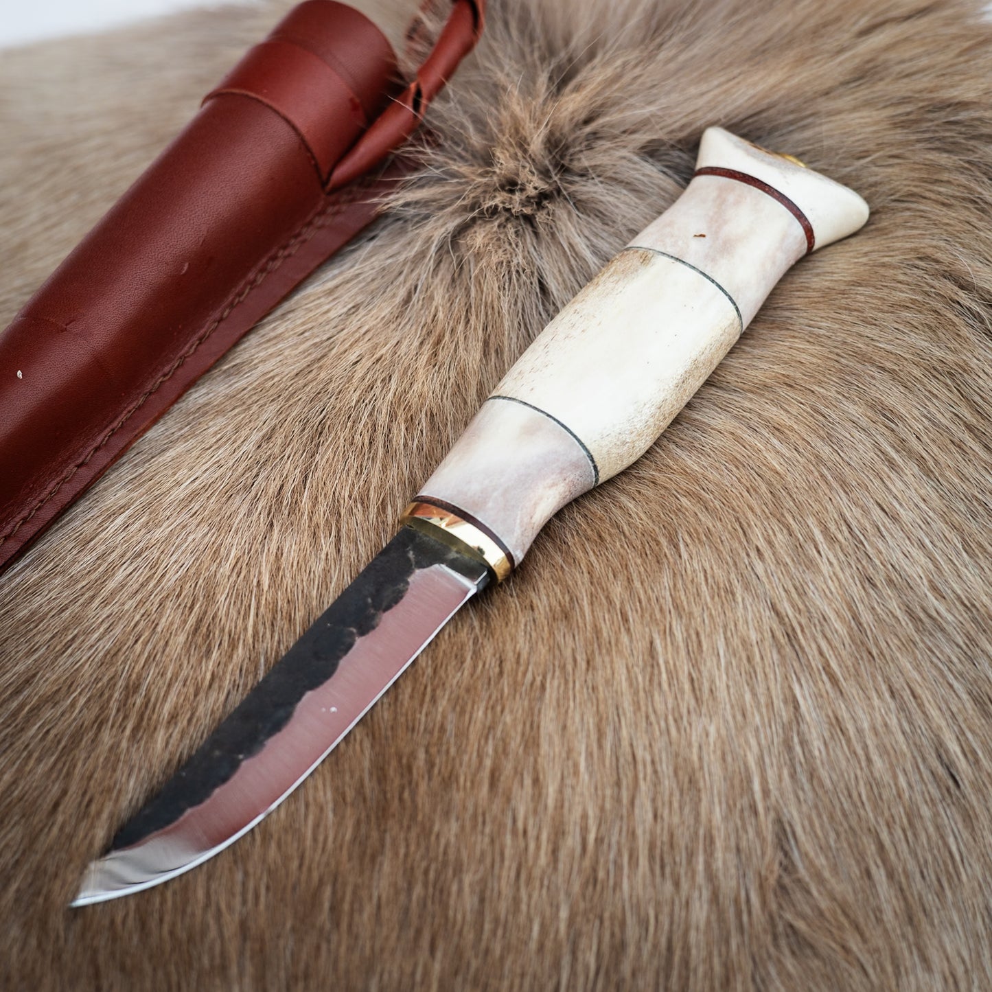 Kniv 9,5 cm skaft av renhorn kolstålsblad