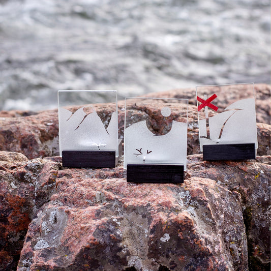 Ljuslyktor för värmeljus med motiv av Ledkryss Tuolpagorni och Lapporten